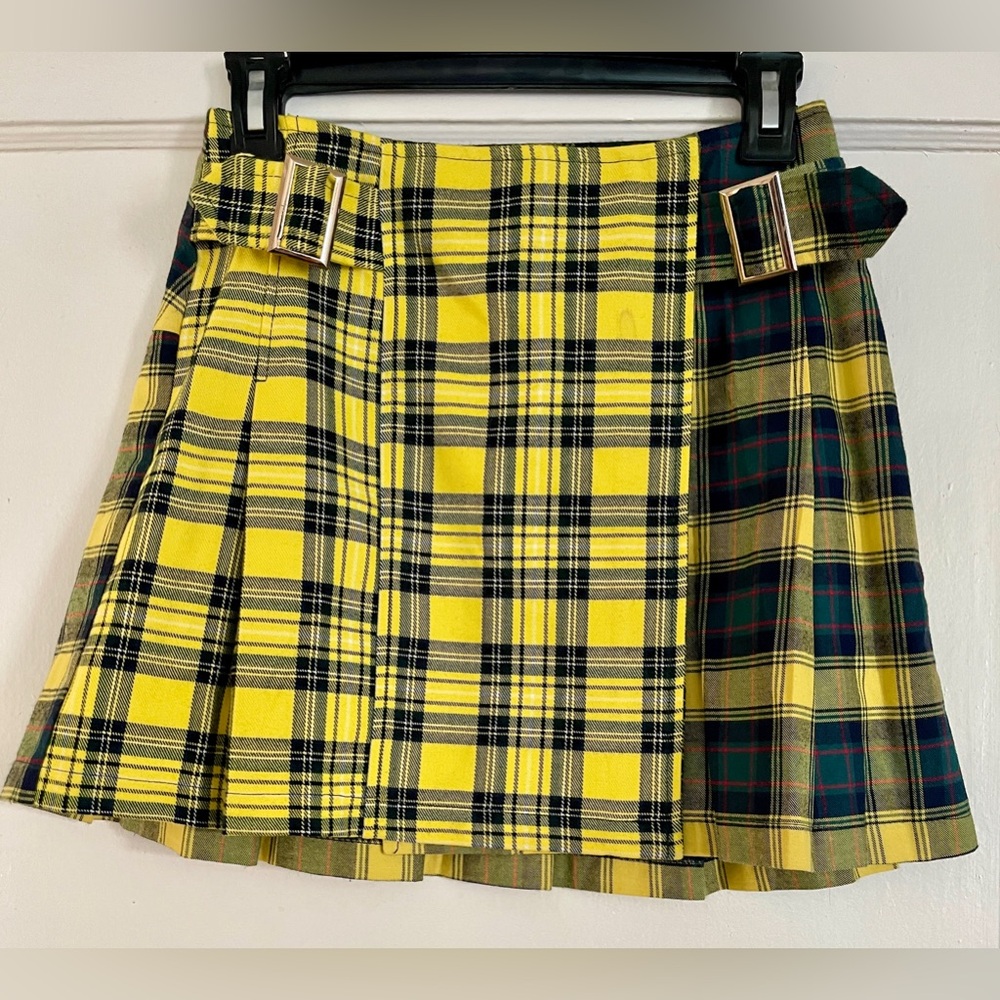 Mini skirt with snap and buckles. Size small. Yellow plaid.